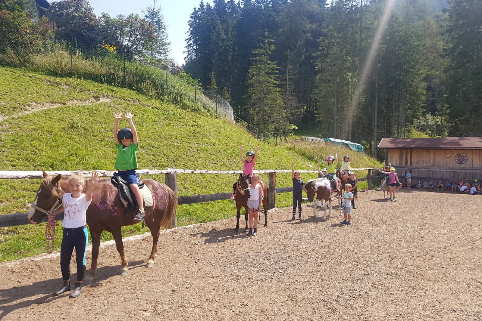 Children with the ponies at the holiday farm