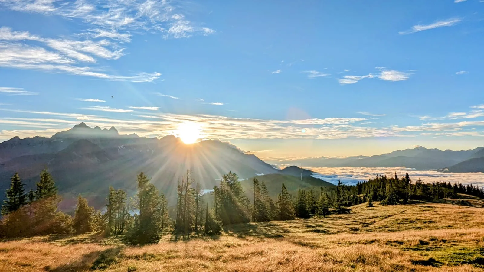 Sunrise over alpine meadows and mountains in Salzburger Land
