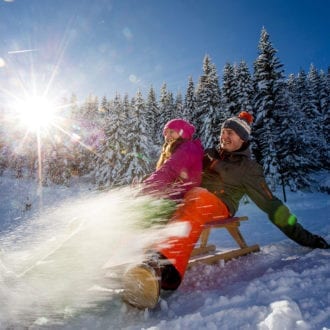 Rodeln im Winterurlaub in Radstadt, Salzburger Land